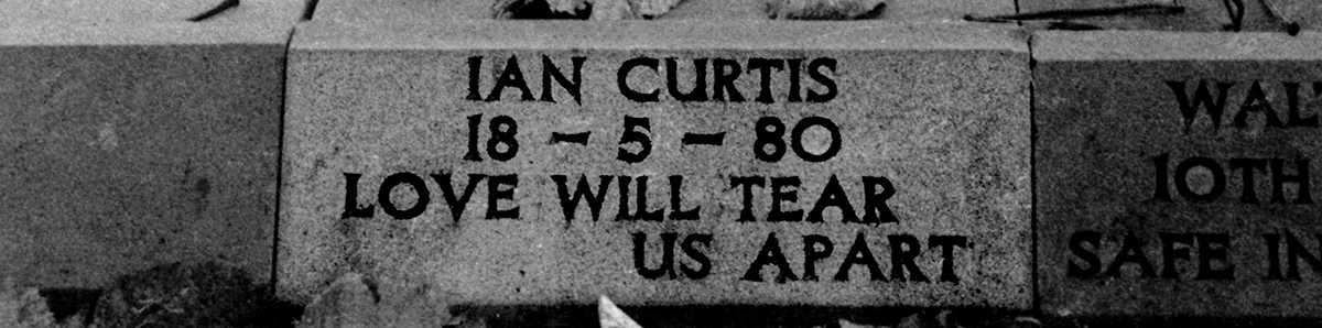 A detail of Ian Curtis's memorial stone
